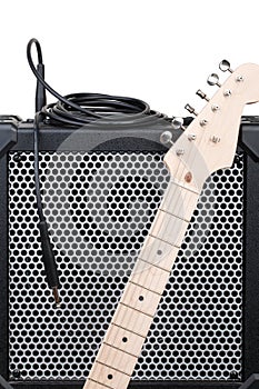 Electric guitar with amplifier and audio cord with jack