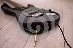 Electric guitar with audio cable