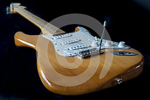 Electric guitar on black background