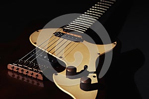 Electric guitar on black background. Musical instrument