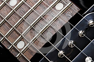 Electric guitar close-up. Neck and humbucker picku