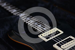 Electric guitar on a dark. photo