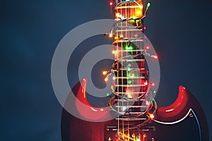 Electric guitar with festive Christmas lights