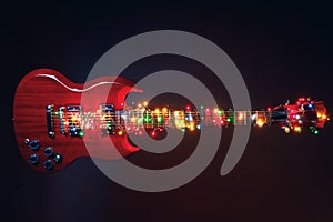 Electric guitar with festive Christmas lights