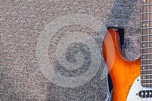 Electric guitar on the gray background