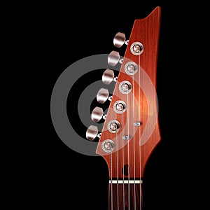 Electric guitar headstock on black