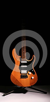 Electric guitar isolated on black background