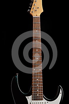 Electric guitar isolated on black background