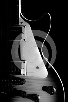 Electric guitar isolated on a black background.