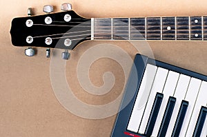 Electric guitar and keyboard neck musical close-up isoled