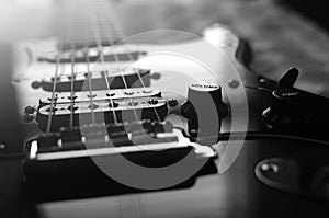 Electric guitar macro abstract black and white, zoom blur
