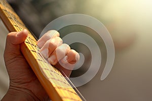 Electric guitar macro abstract, hand playing guitar