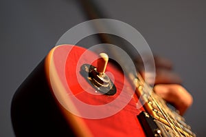 Electric guitar macro abstract, hand playing guitar