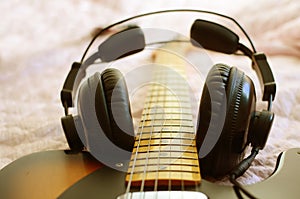 Electric guitar macro abstract and headphones