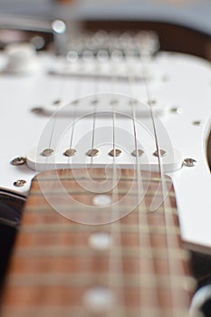 Electric guitar, macro shot, focus on pickup