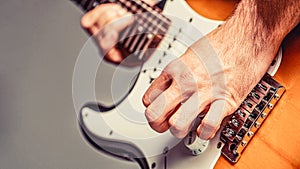 Electric guitar. Man playing guitar. Closeup hand playing guitar. Musician playing guitar, live music. Musical