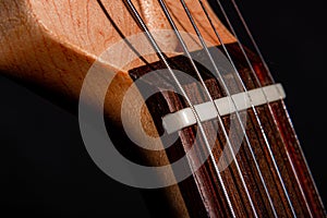 Electric guitar nut closeup