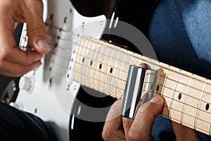 Electric guitar player performing song