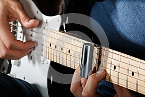 Electric guitar player performing song