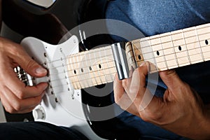 Electric guitar player performing song