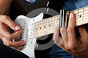 Electric guitar player performing song