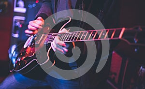 Electric guitar player on a stage