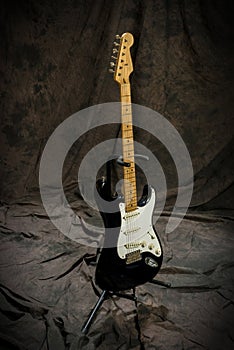 Electric guitar on stand