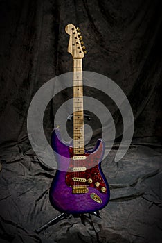 Electric guitar on stand