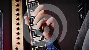 Electric guitar strings, close up. Vertical video. Musical instruments