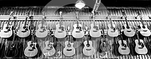 Electric Guitars hanging in a row