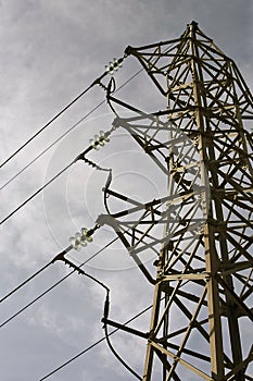 Electric high voltage post with sky background