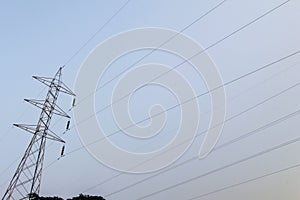 Electric high voltage post with sky background - High voltage po