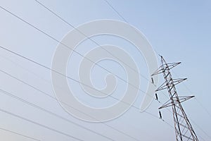 Electric high voltage post with sky background - High voltage po