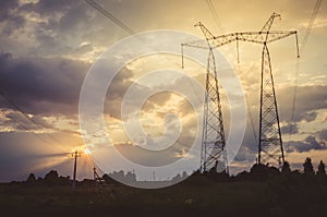 Electric high voltage tower/Electric high voltage tower against sunset