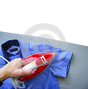 Electric iron blue shirt backgroundn domestic housework photo