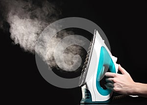 Electric iron with steam