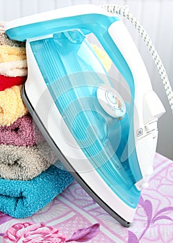 Electric iron and towels