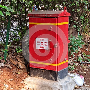 Electric junction box with warning sign
