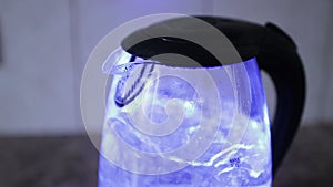 Electric kettle with blue led light, boil water for tea, dark