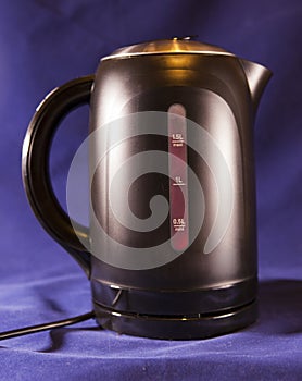 Electric kettle, measured mark water level red color - a boiling sign