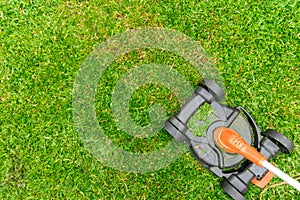 Electric Lawn Mower Grass Cutting on home garden