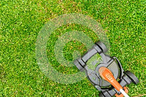 Electric Lawn Mower Grass Cutting on home garden