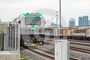Electric locomotive at a charging station next to the train depot