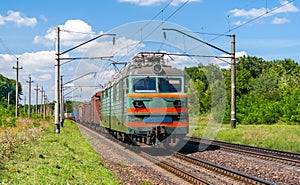 Electric locomotive hauling a cargo train