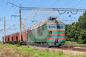 Electric locomotive hauling a grain train