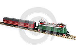 Electric locomotive model with wagons isolated on white