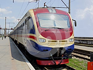 Electric locomotive stands on rails