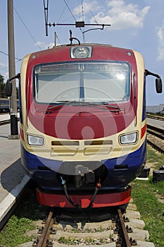 Electric locomotive stands on rails