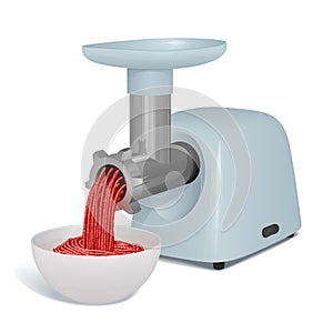 Electric meat grinder with a tray for meat and a metal pipe twists meat for cutlets, a plate with ready forcemeat nearby