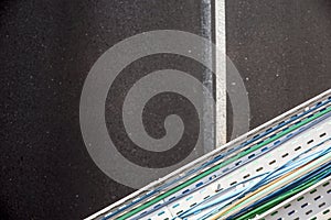 Electric metal channel .electric cables inside the cable duct in an industrial building
